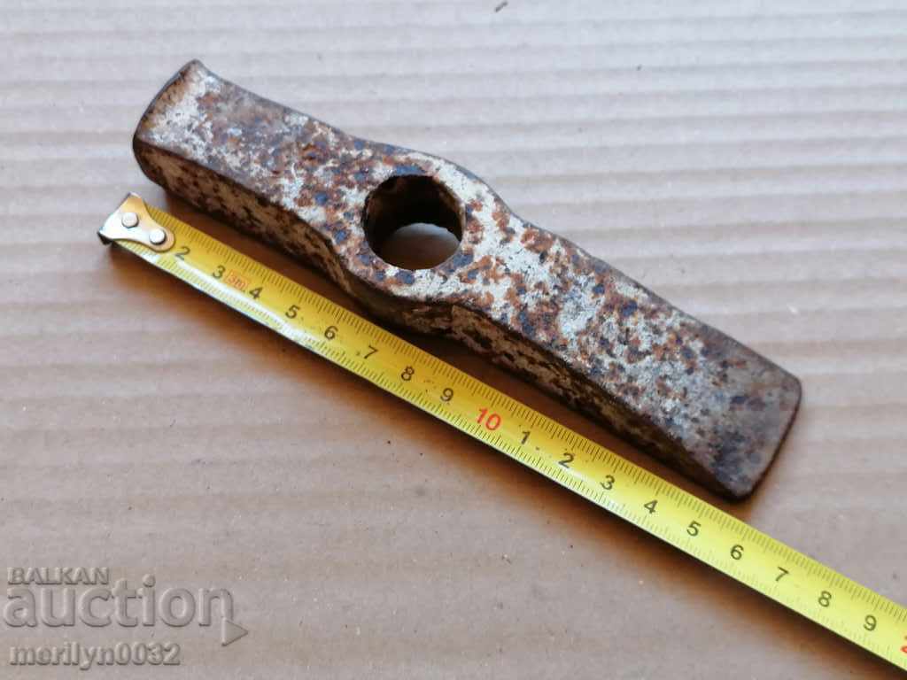 Delivery of Old carpenter's hammer, tool, pickaxe Delivery of Old carpenter's hammer, tool, pickaxe