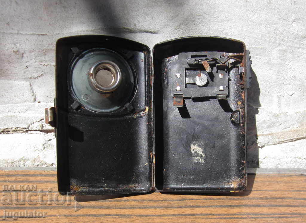 Delivery of old metal flashlight lantern