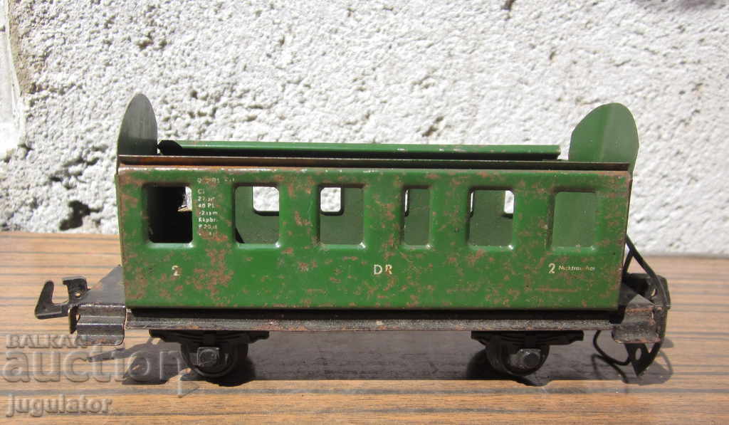 Auction  old german metal sheet metal toy wagons