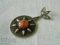 Old filigree medallion with natural stone 12.09.2021