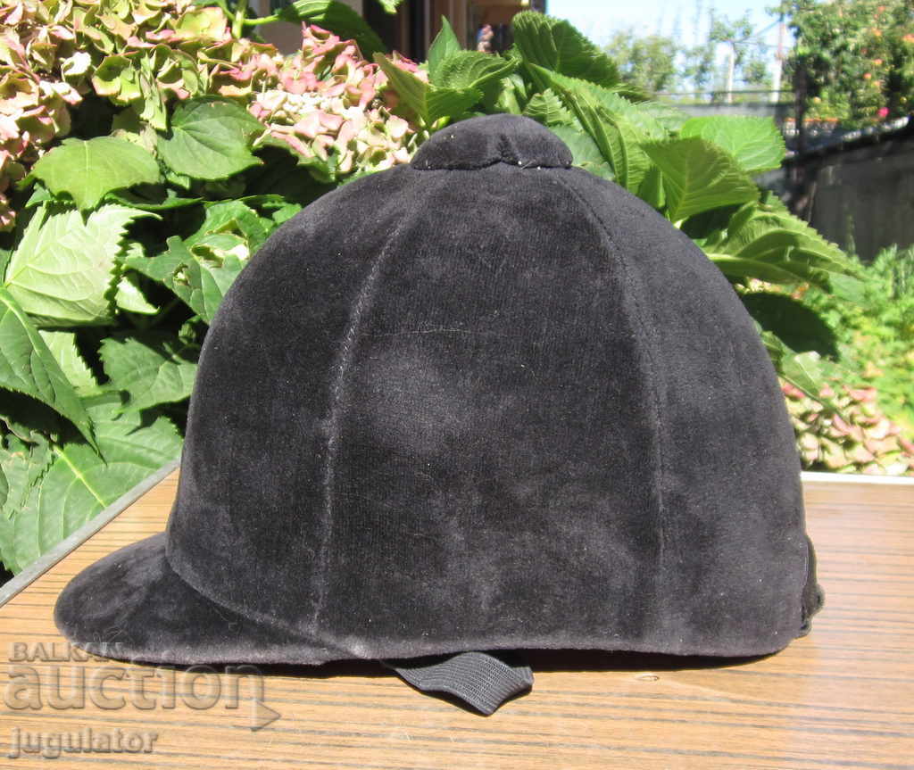 old hat helmet with velvet on jockey equestrian sport