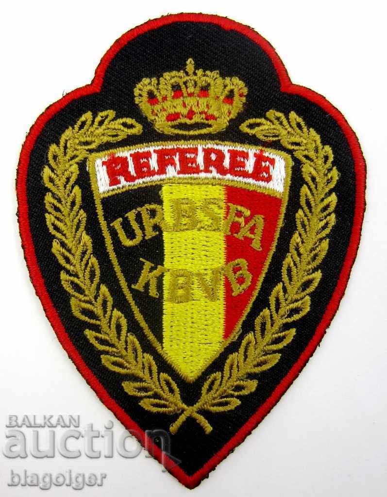 Ποδοσφαιρική Ομοσπονδία του Βασιλείου του Βελγίου-Διαιτητές-Κριτής-Έμβλημα
