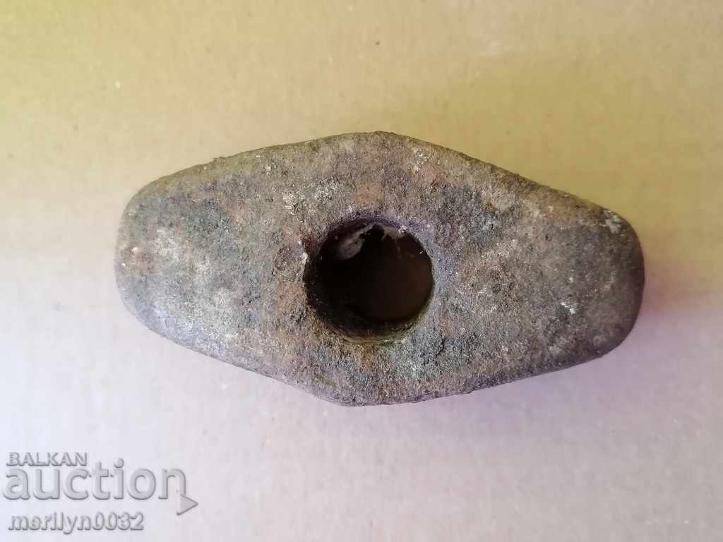 Delivery of An old stone hammer, a tool, a kink Delivery of An old stone hammer, a tool, a kink