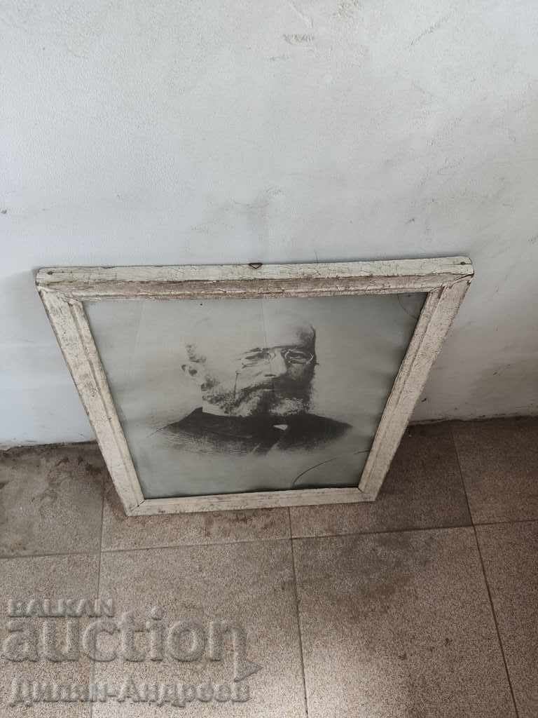 Vintage portrait in a frame with glass
