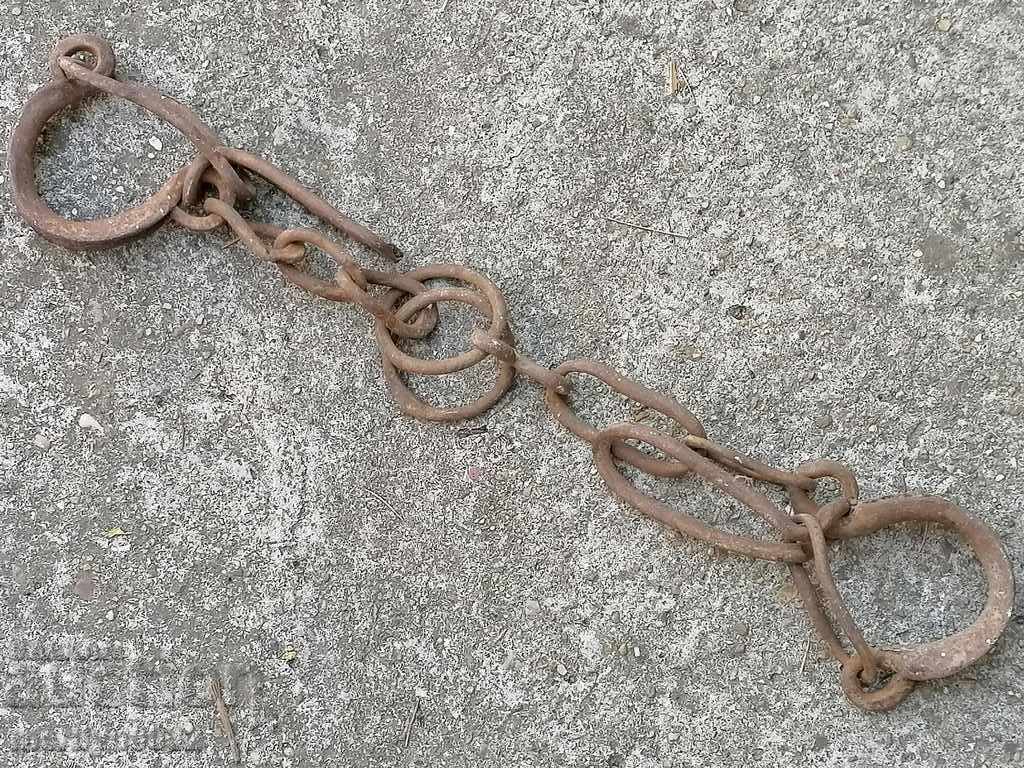 Hand forged buckles, shackles, chain, wrought iron Hand forged buckles, shackles, chain, wrought iron