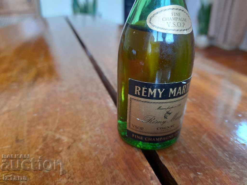 Old bottle of Remy Martin with price 15.00 BGN | € 7.67