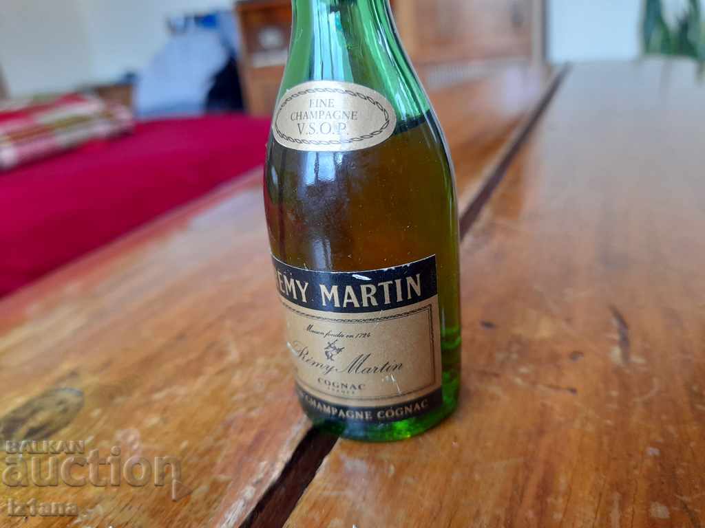 Auction  Old bottle of Remy Martin