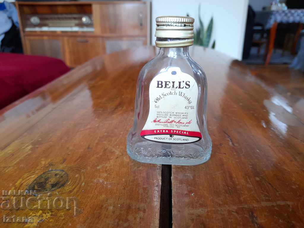 Sticlă veche de la Bells