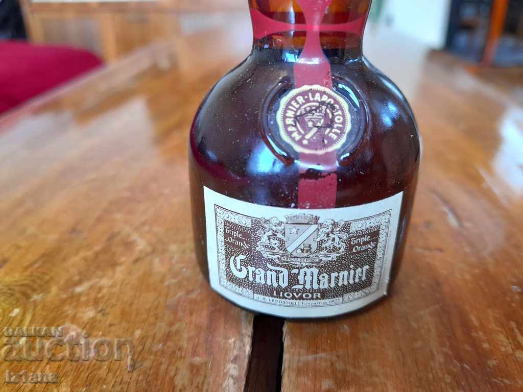 Old bottle of Grand Mariner with price 15.00 BGN | € 7.67 Old bottle of Grand Mariner with price 15.00 BGN | € 7.67