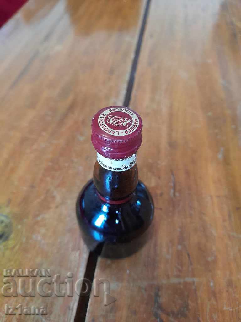 Delivery of Old bottle of Grand Mariner Delivery of Old bottle of Grand Mariner