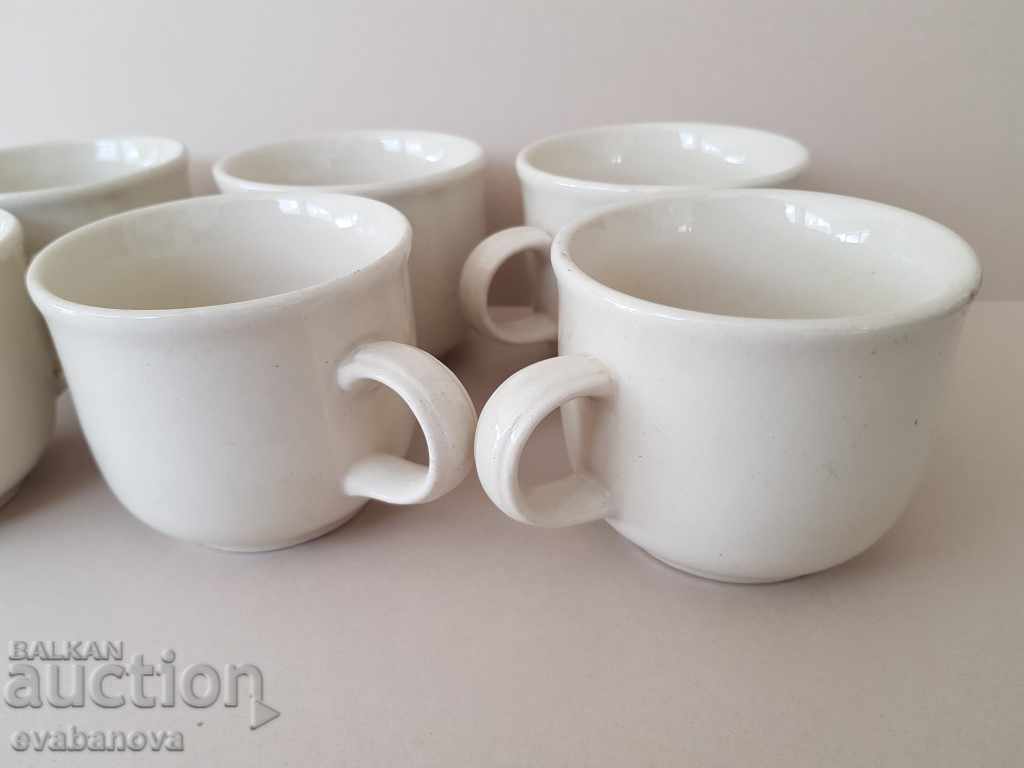 Auction 6 Stylish elegant porcelain cups for coffee service Auction 6 Stylish elegant porcelain cups for coffee service