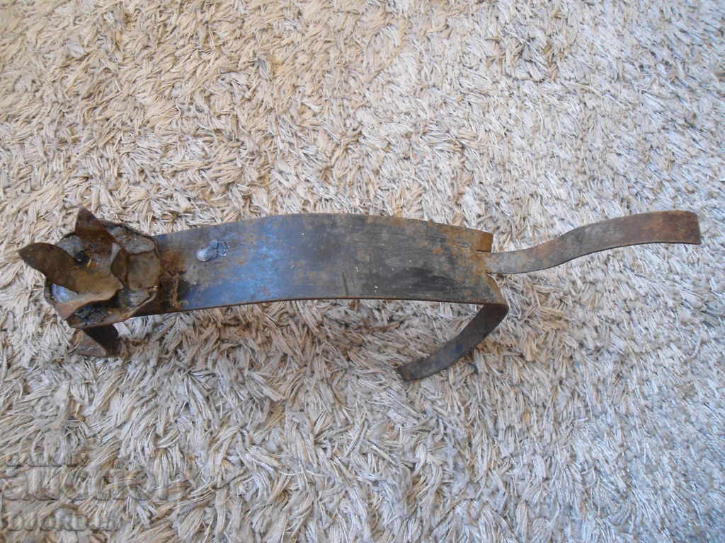 Delivery of An old forged candlestick Delivery of An old forged candlestick