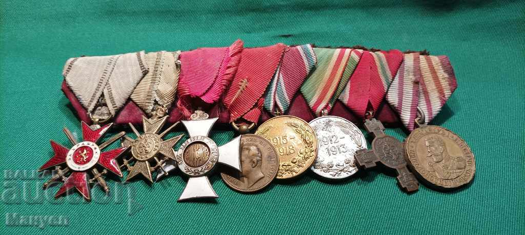 I am selling an old pad of Bulgarian orders and medals.