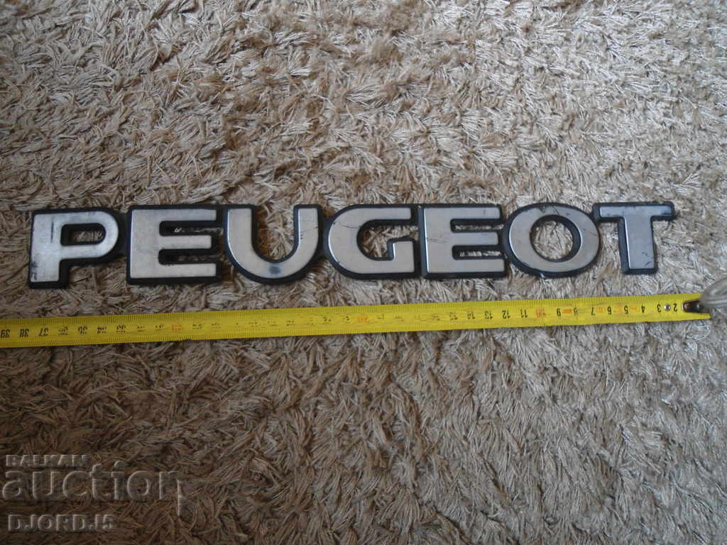 Auction Old Peugeot emblem Auction Old Peugeot emblem