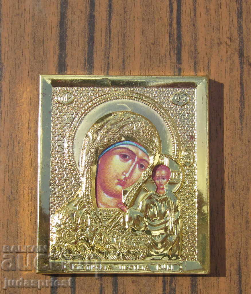 Russian old armilla home icon with metal fittings Virgin Mary