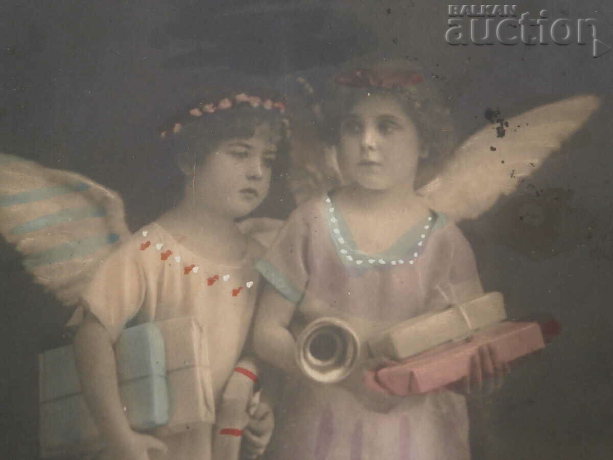 Delivery of vintage Christmas card with angels 20s Delivery of vintage Christmas card with angels 20s