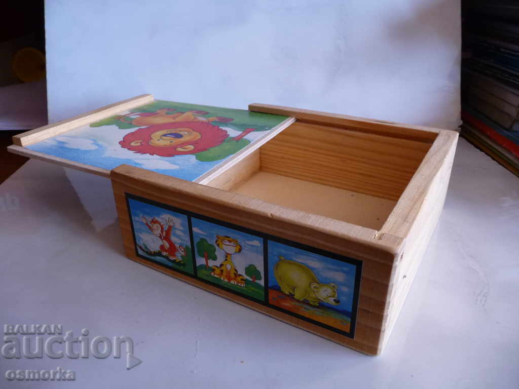 Auction  Wooden box with a picture of a lion cub for children