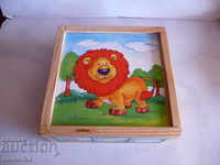 Wooden box with a picture of a lion cub for children