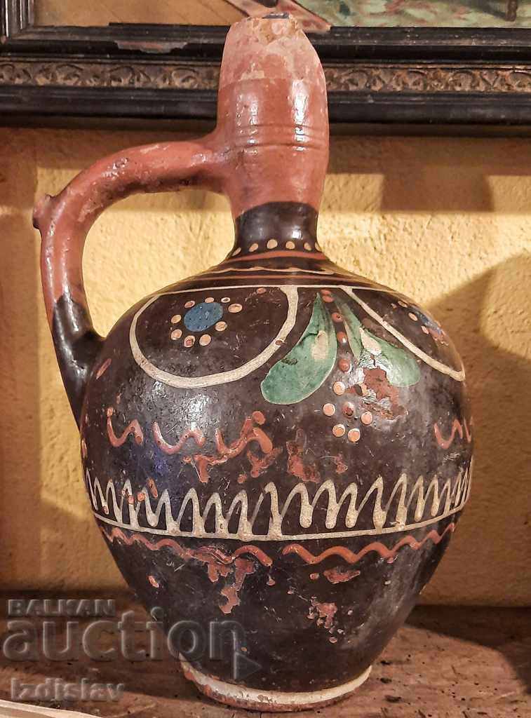 Unique old ceramic pitcher