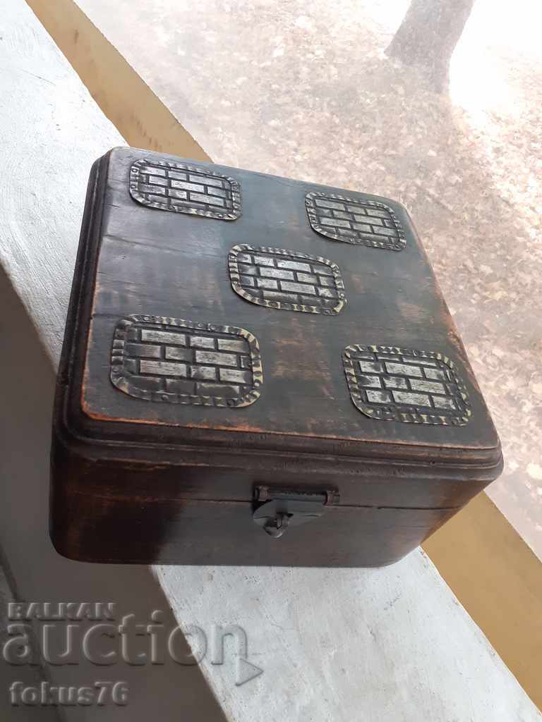 Antique wooden box with metal fittings