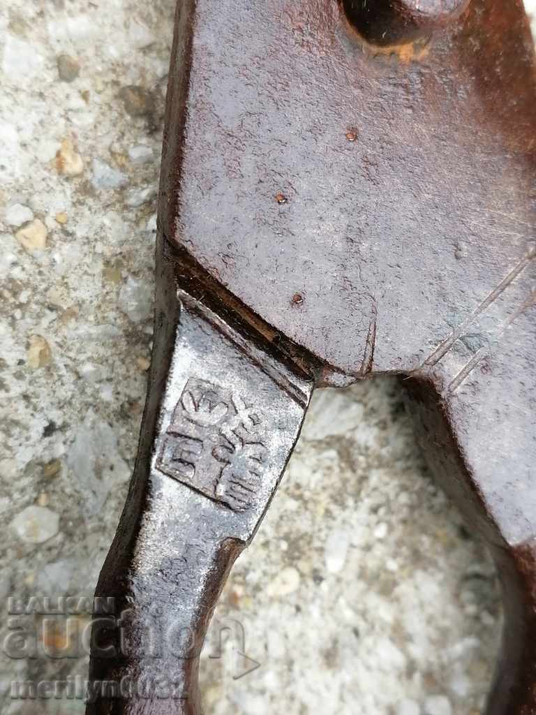 Old forged scissors with master stamp, wrought iron
