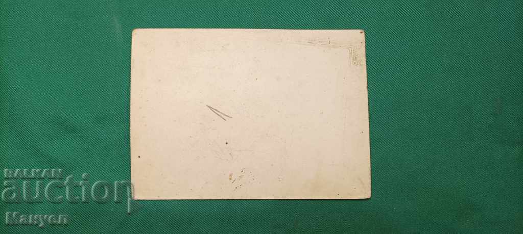 Auction  I am selling an old cardboard photo.