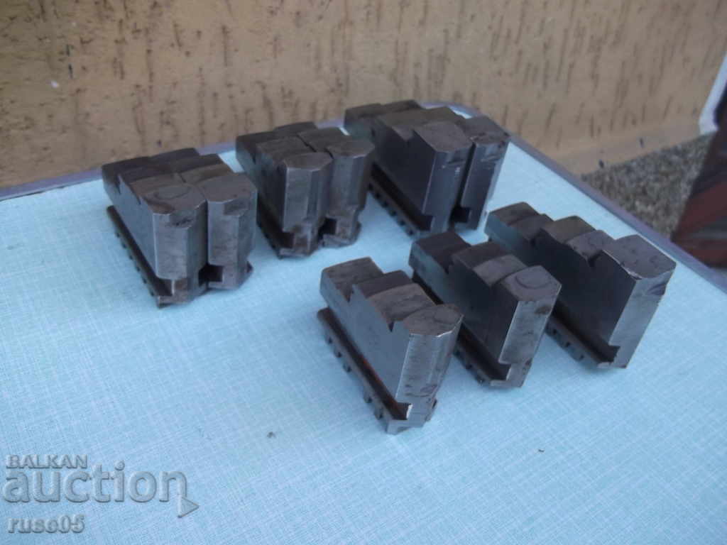 Auction Lot of 9 pcs. universal jaws Auction Lot of 9 pcs. universal jaws