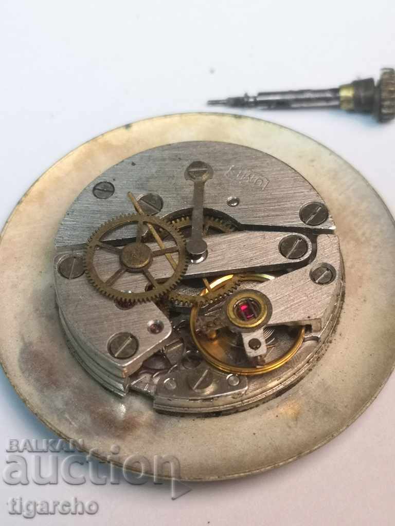 Auction  EXAKT clock machine