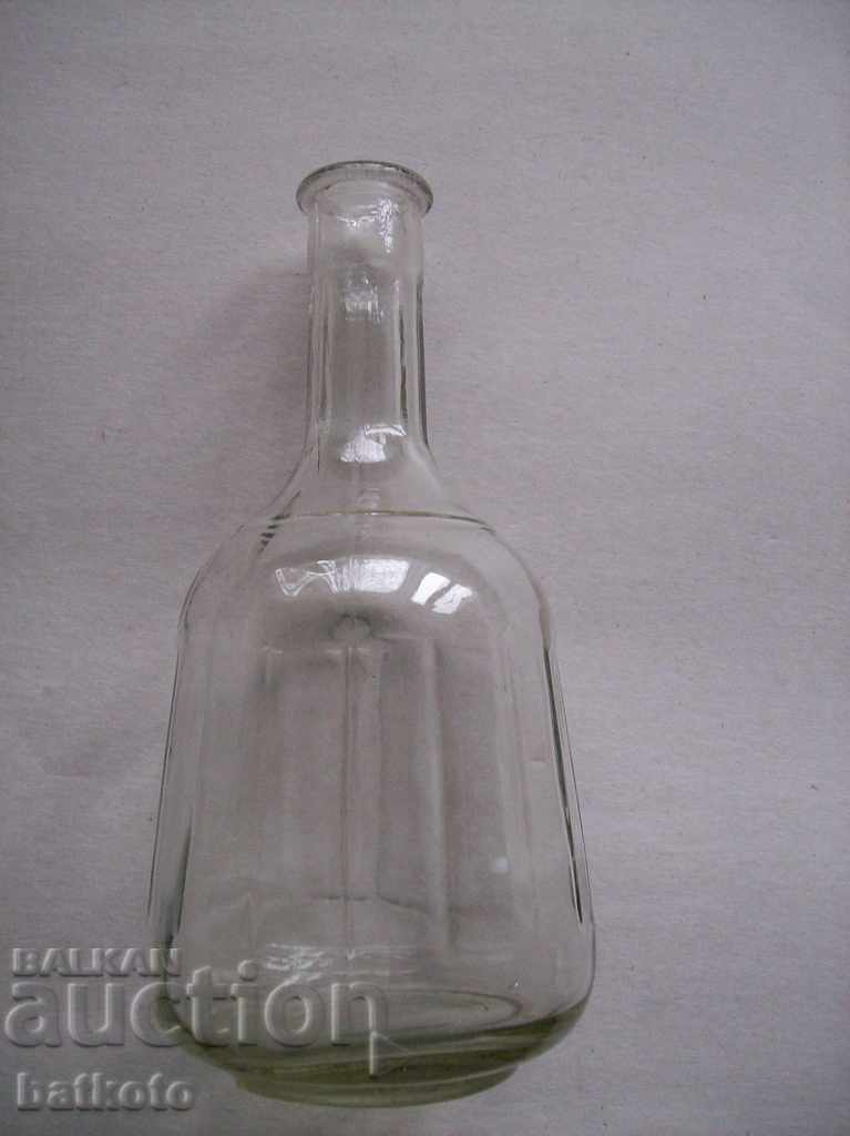 An old carafe, a bottle, a bottle of sauce