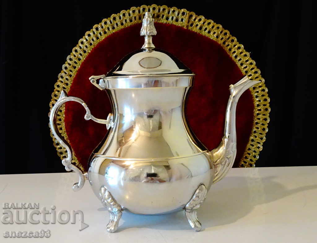 Auction Silver-plated bronze jug, English. Auction Silver-plated bronze jug, English.