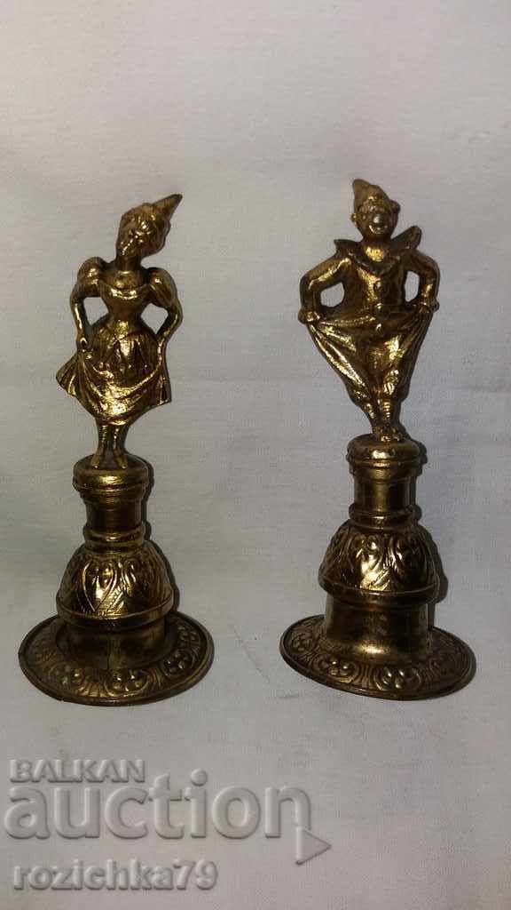 Old bronze candle extinguishers with gilding