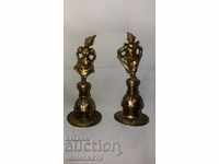 Old bronze candle extinguishers with gilding