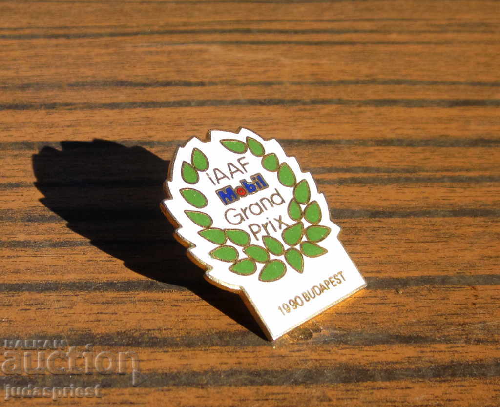 Delivery of enameled sports badge sign IAAF Mobil GRAND PRIX Delivery of enameled sports badge sign IAAF Mobil GRAND PRIX