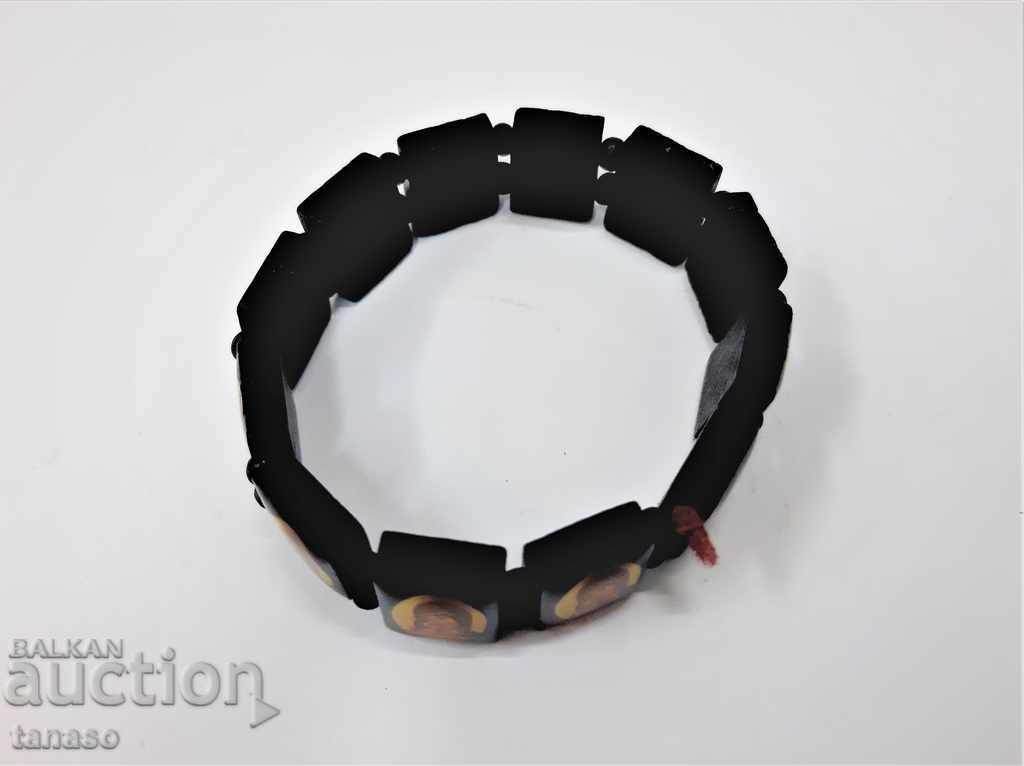 Black wooden bracelet with orthodox icons with price 20.00 BGN | € 10.23