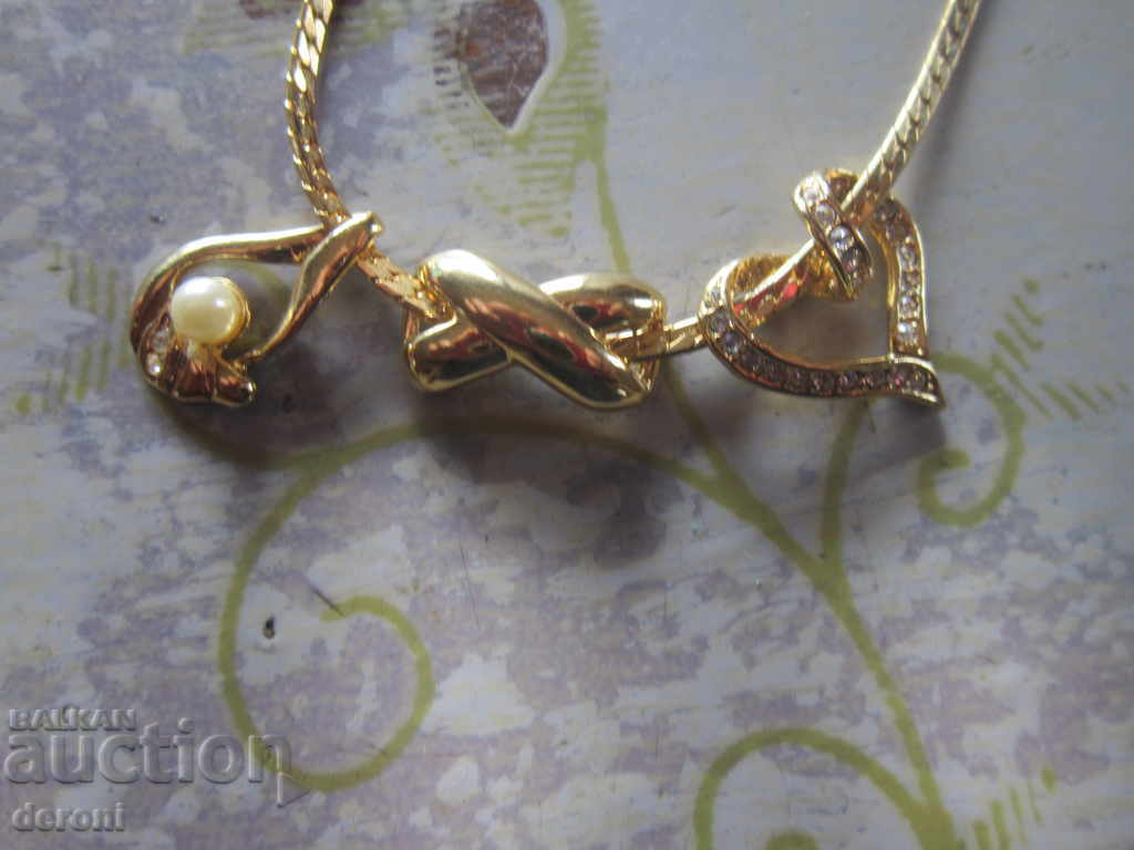 Unique gilded necklace necklace with pearl with price 15.00 BGN | € 7.67 Unique gilded necklace necklace with pearl with price 15.00 BGN | € 7.67