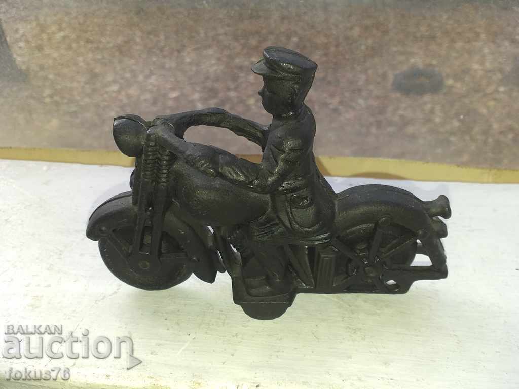 Auction Motorcyclist cast iron figure statuette Auction Motorcyclist cast iron figure statuette