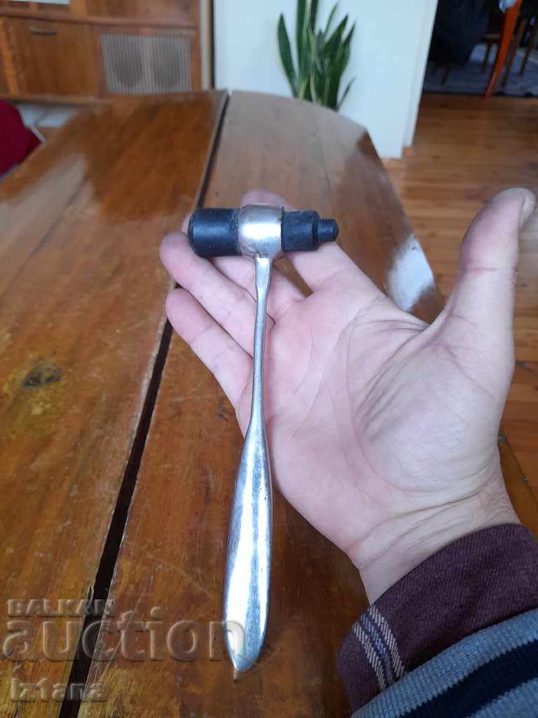 Delivery of An old medical hammer Delivery of An old medical hammer