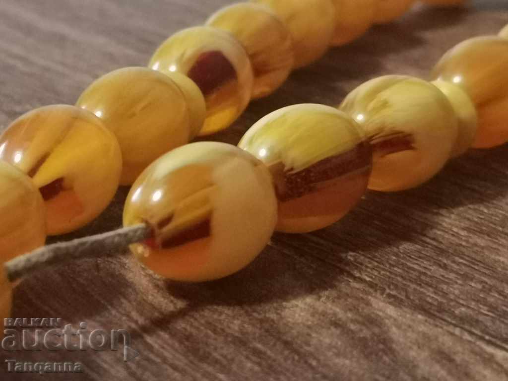 Delivery of Unique amber rosary