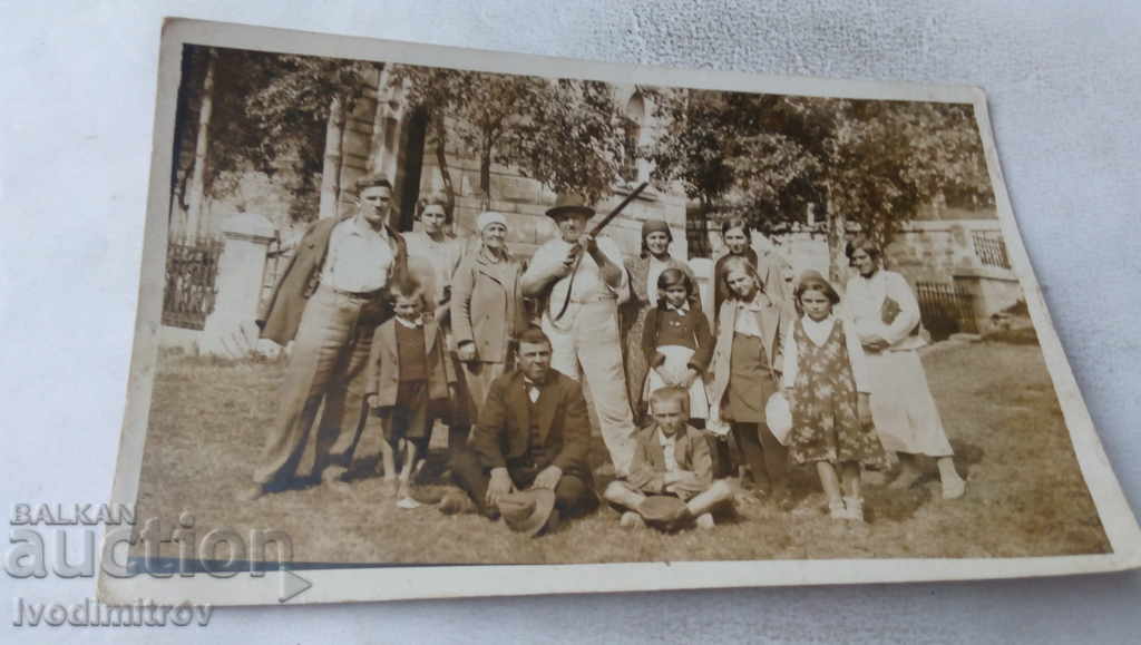 Photo The whole family and the cartridge with a hunting rifle 1933