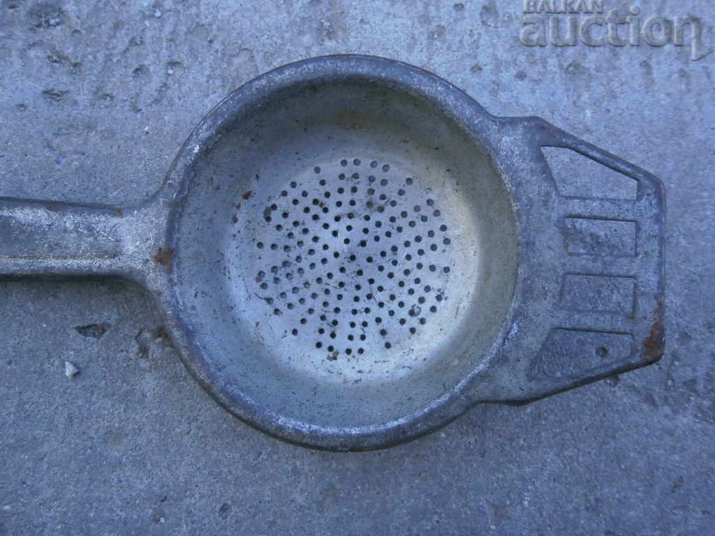 Delivery of retro vintage household appliance strainer Delivery of retro vintage household appliance strainer