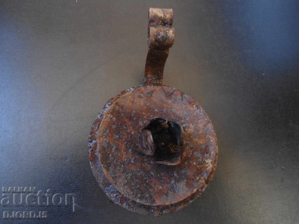 An old forged candlestick with price 3.00 BGN | € 1.53