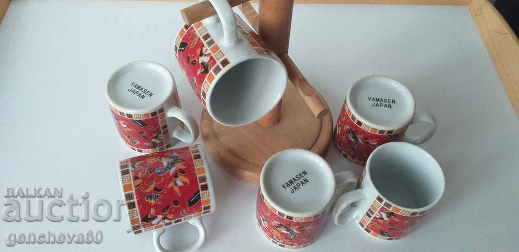 Auction Beautiful painted coffee mugs with wooden stand Auction Beautiful painted coffee mugs with wooden stand
