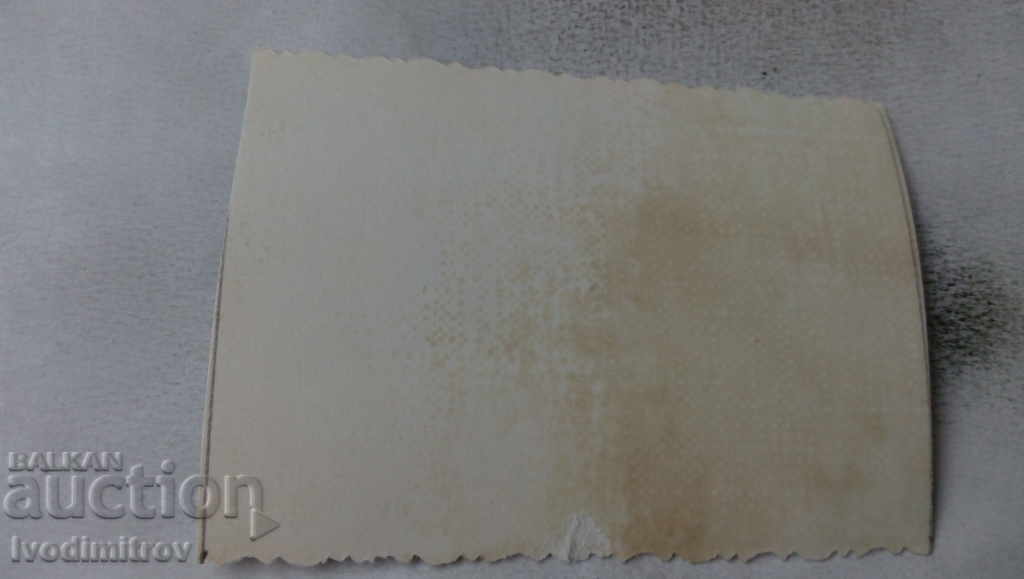 Photo Two men, a woman and a child on the beach with price 2.35 BGN | € 1.20 Photo Two men, a woman and a child on the beach with price 2.35 BGN | € 1.20