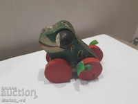 Old wooden toy frog