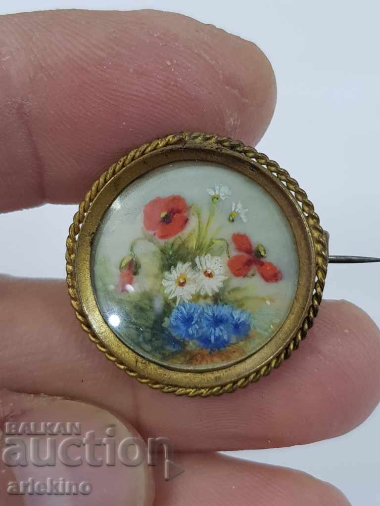 Hand-painted old gilded brooch of the early 20th century