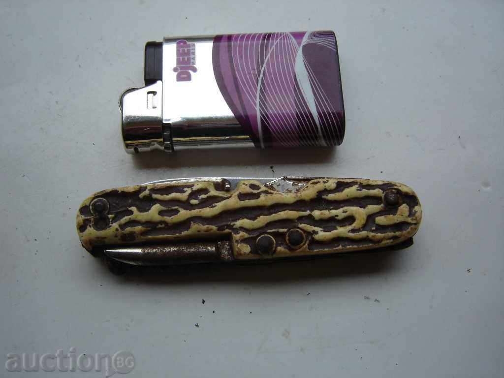 AN OLD POCKET KNIFE AN OLD POCKET KNIFE