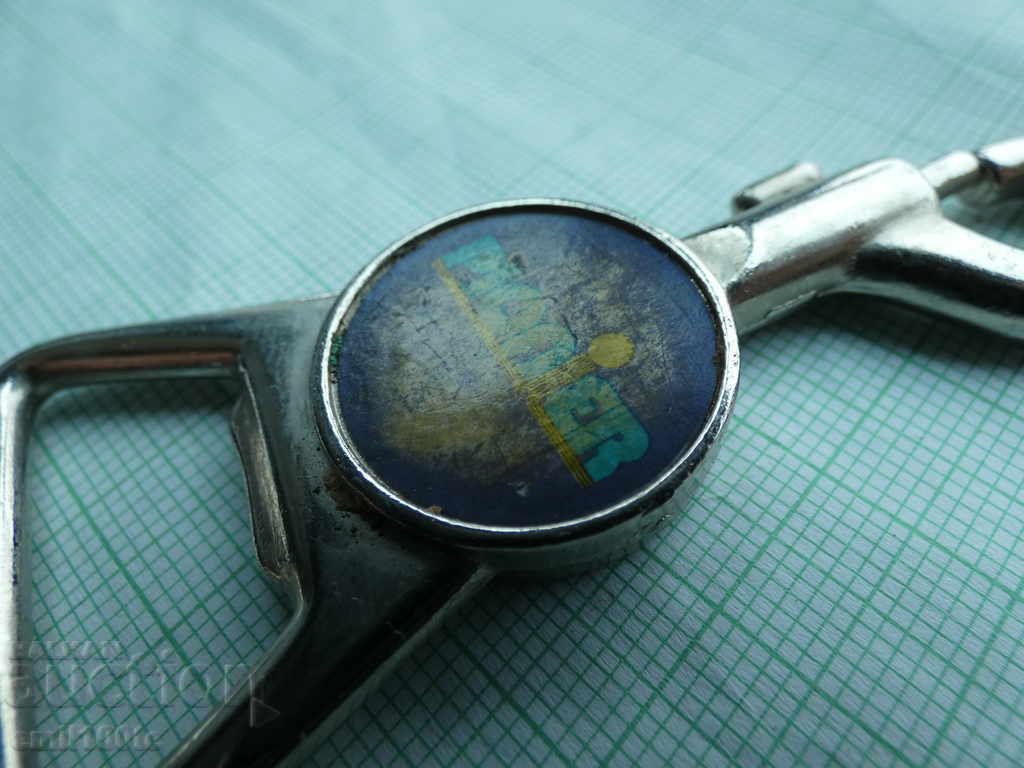 Delivery of Keychain with beer opener promotional jeans PIONIER