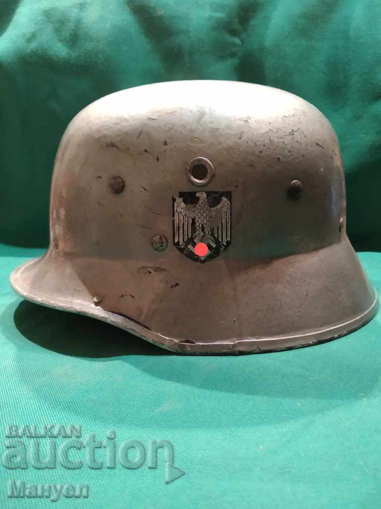 We are selling a Wehrmacht Helmet M 35-row!