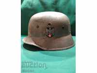 We are selling a Wehrmacht Helmet M 35-row!
