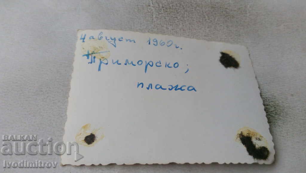 Photo Primorsko Man and woman on the beach 1960 with price 1.65 BGN | € 0.84 Photo Primorsko Man and woman on the beach 1960 with price 1.65 BGN | € 0.84